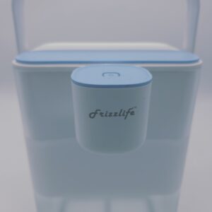 Frizzlife MD40 portable water filter pitcher on kitchen counter showing lid and filter cartridge – Carib Sunsations